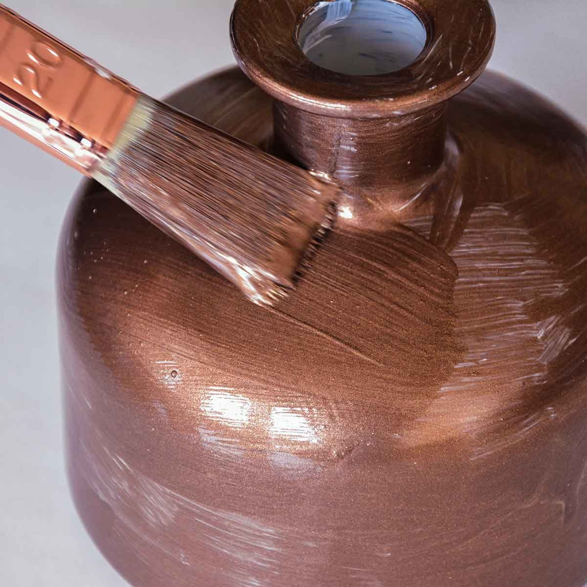 Bronze sprit. Behandling med primer og før behandling med Bronce Spirit